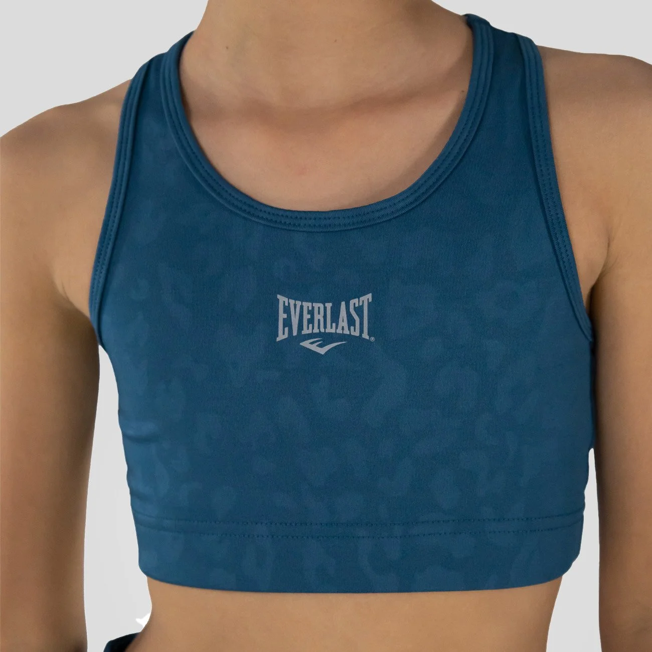 detalle delbra everlast jr leopard, telas transpirables